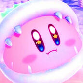 A photo of a Nintendo hero named Kirby. Kirby is wearing a toothed helmet.